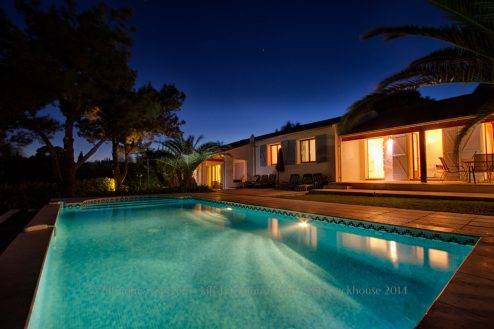 Twilight pool and house